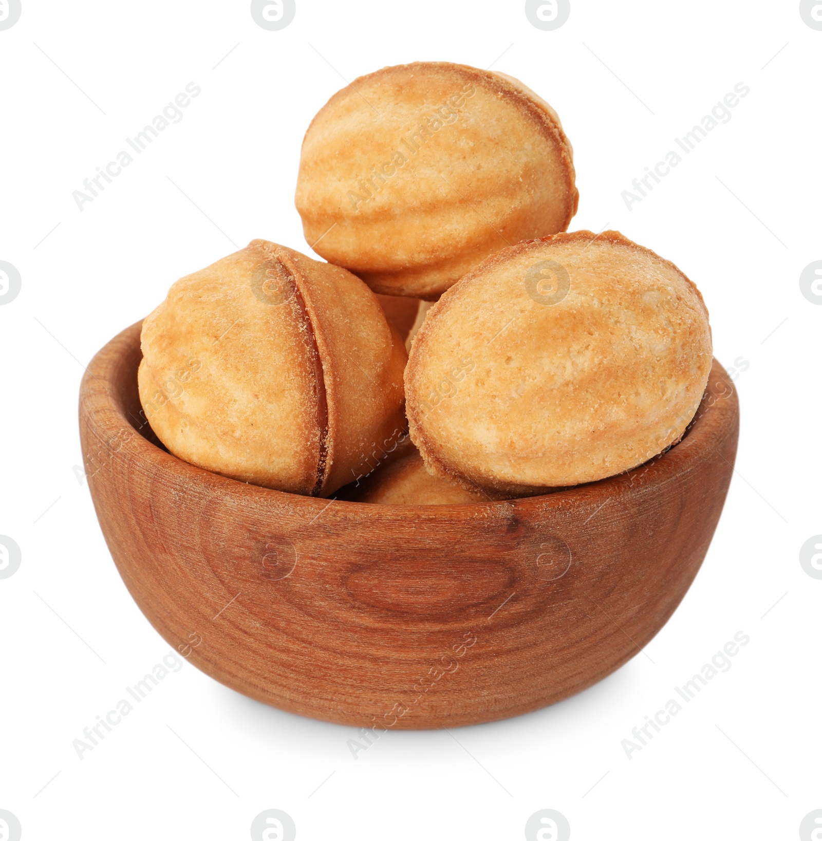 Photo of Bowl of delicious nut shaped cookies with condensed milk on white background