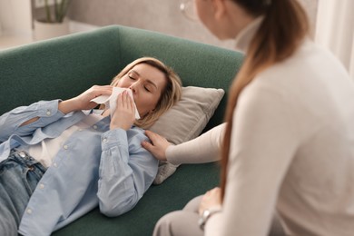 Professional psychotherapist working with patient in office