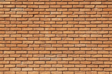 Texture of orange brick wall as background