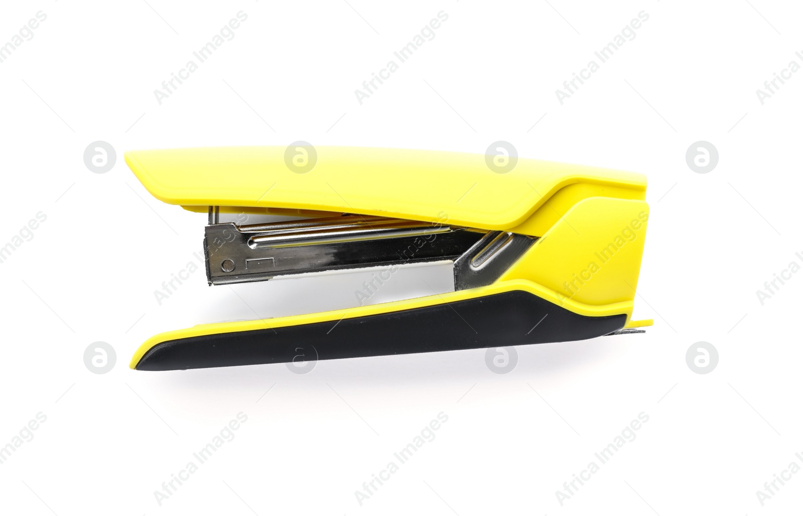 Photo of Yellow stapler on white background. Stationery for school