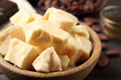 Organic cocoa butter on table, closeup view