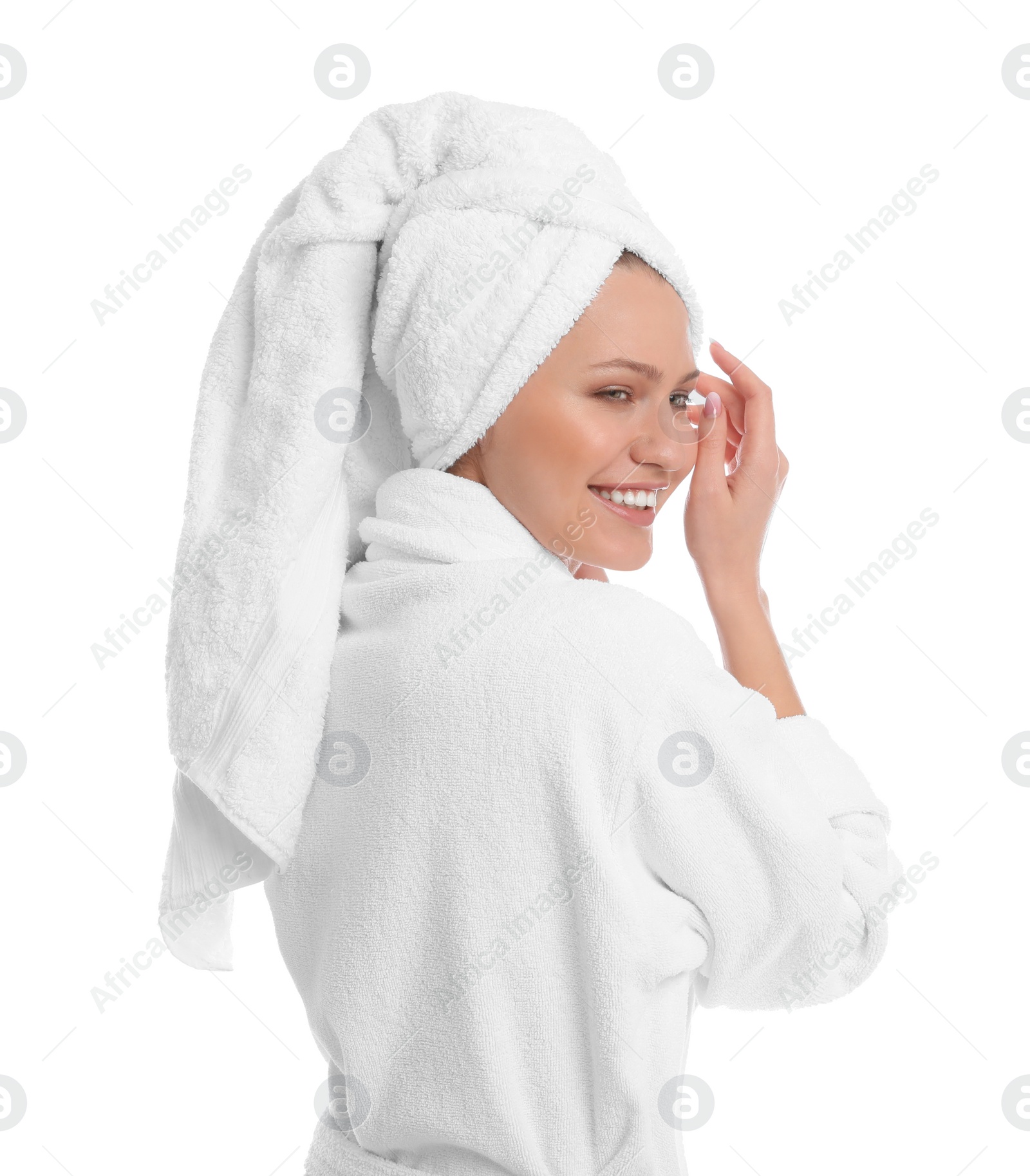 Photo of Young woman in bathrobe on white background