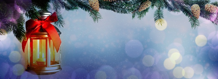 Image of Beautiful Christmas lantern hanging on fir tree branch, bokeh effect. Banner design with space for text