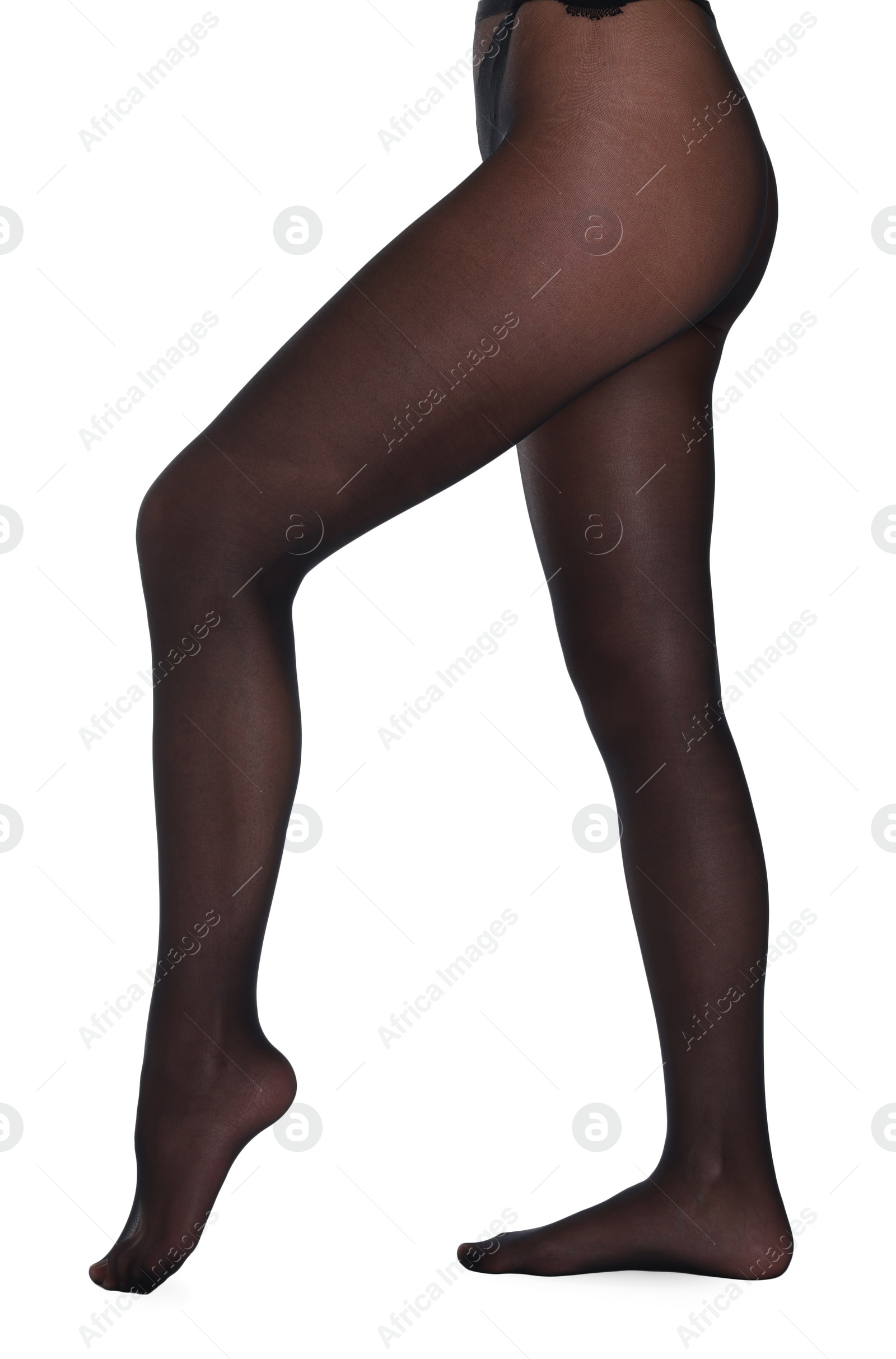 Photo of Woman with beautiful long legs wearing black tights on white background, closeup