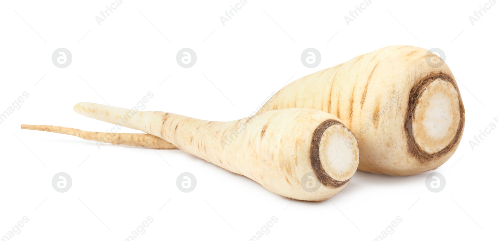 Photo of Tasty fresh ripe parsnips on white background