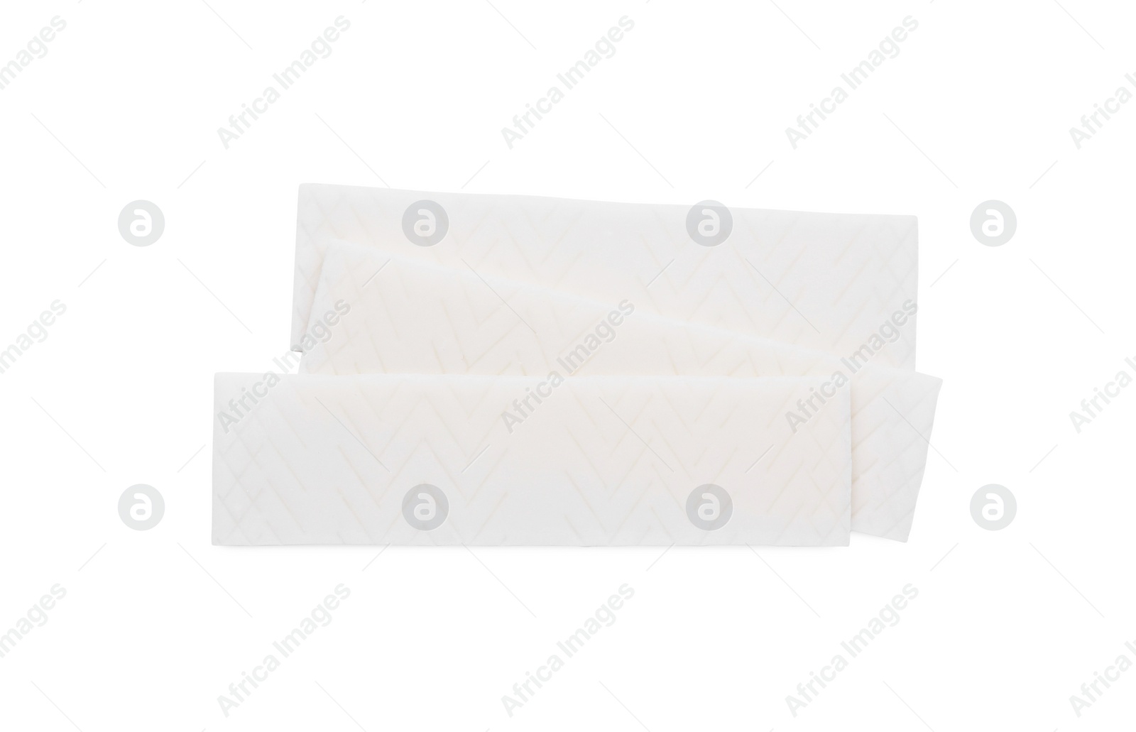 Photo of Sticks of tasty chewing gum isolated on white, top view