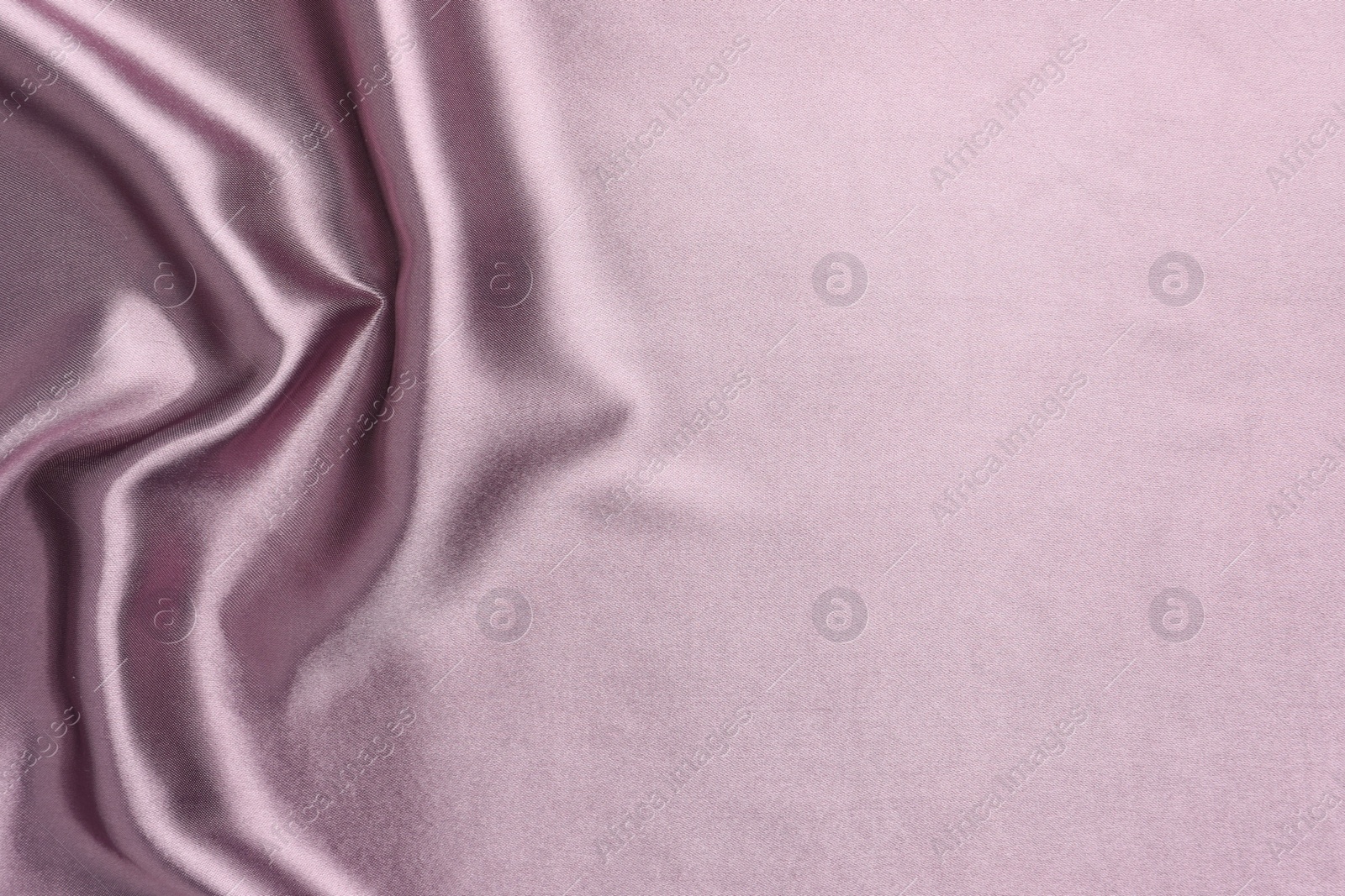 Photo of Texture of beautiful silk fabric as background, closeup