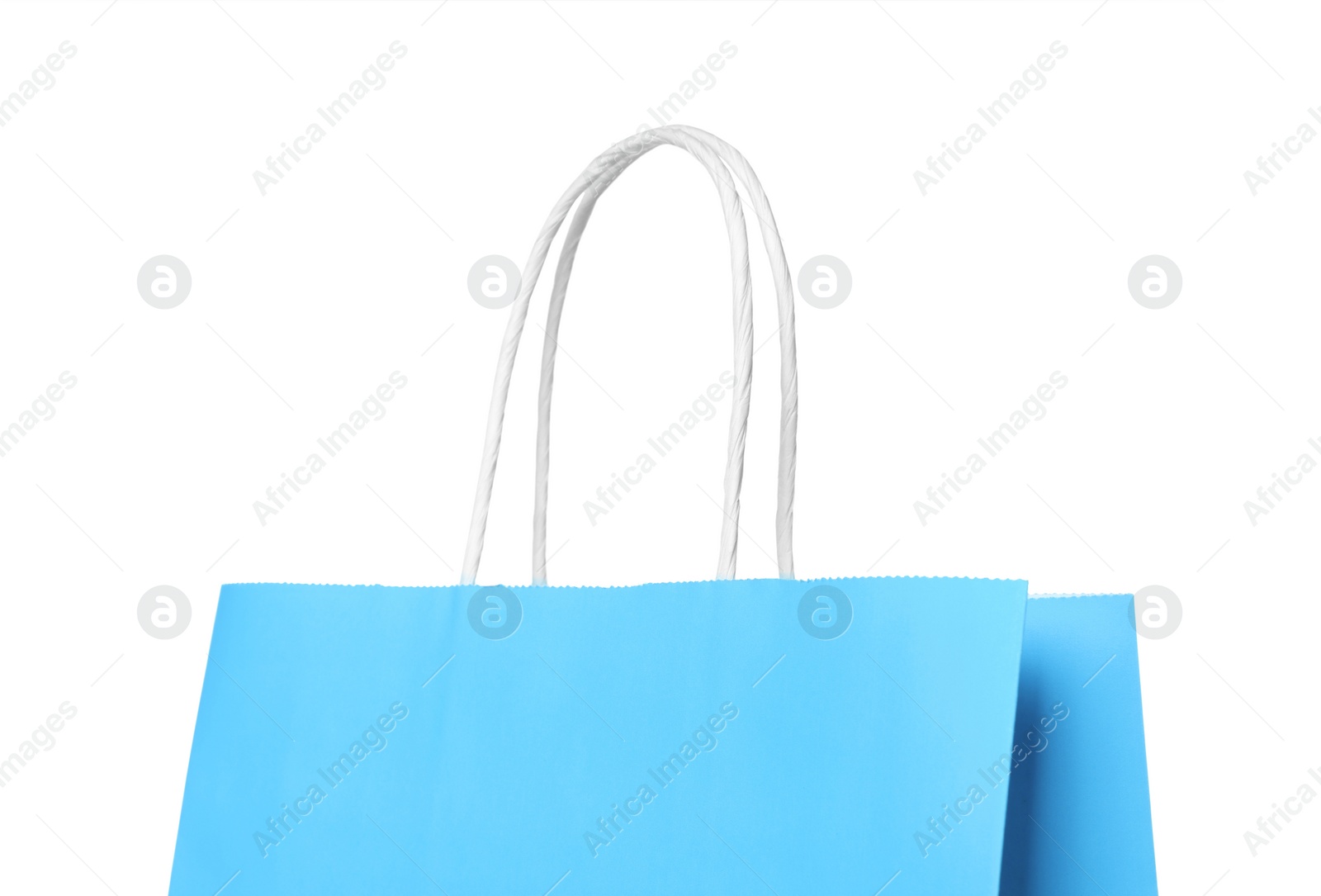 Photo of Light blue gift paper bag on white background