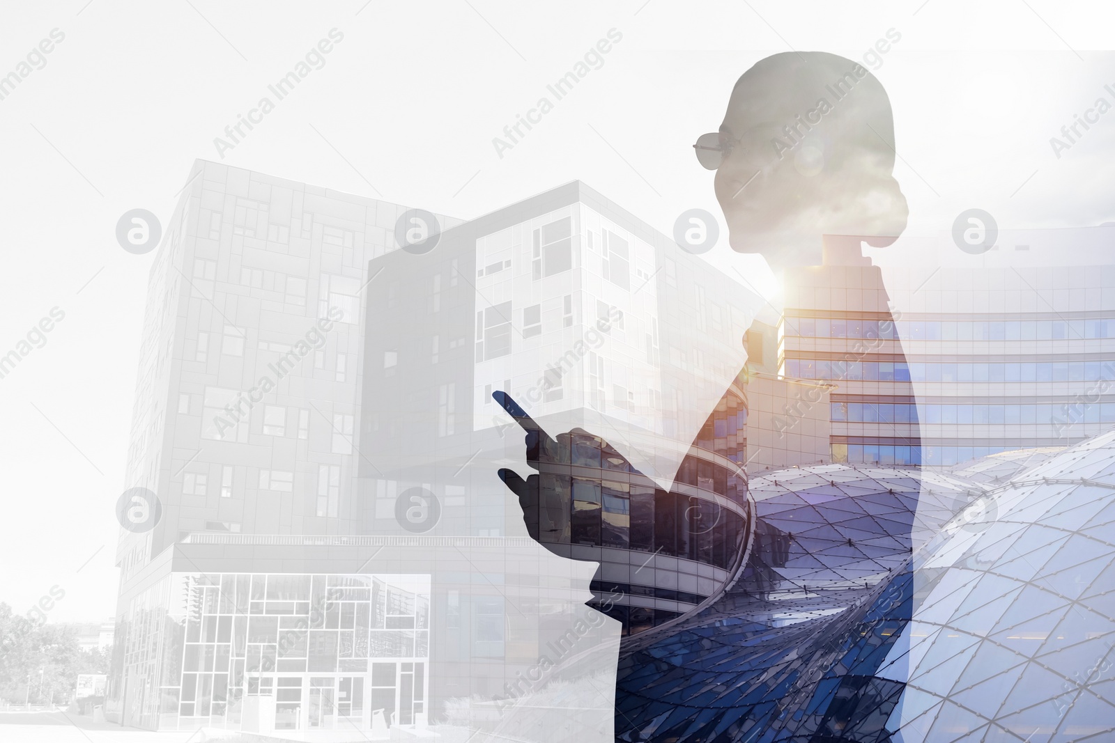 Image of Double exposure of businesswoman and cityscape with office buildings