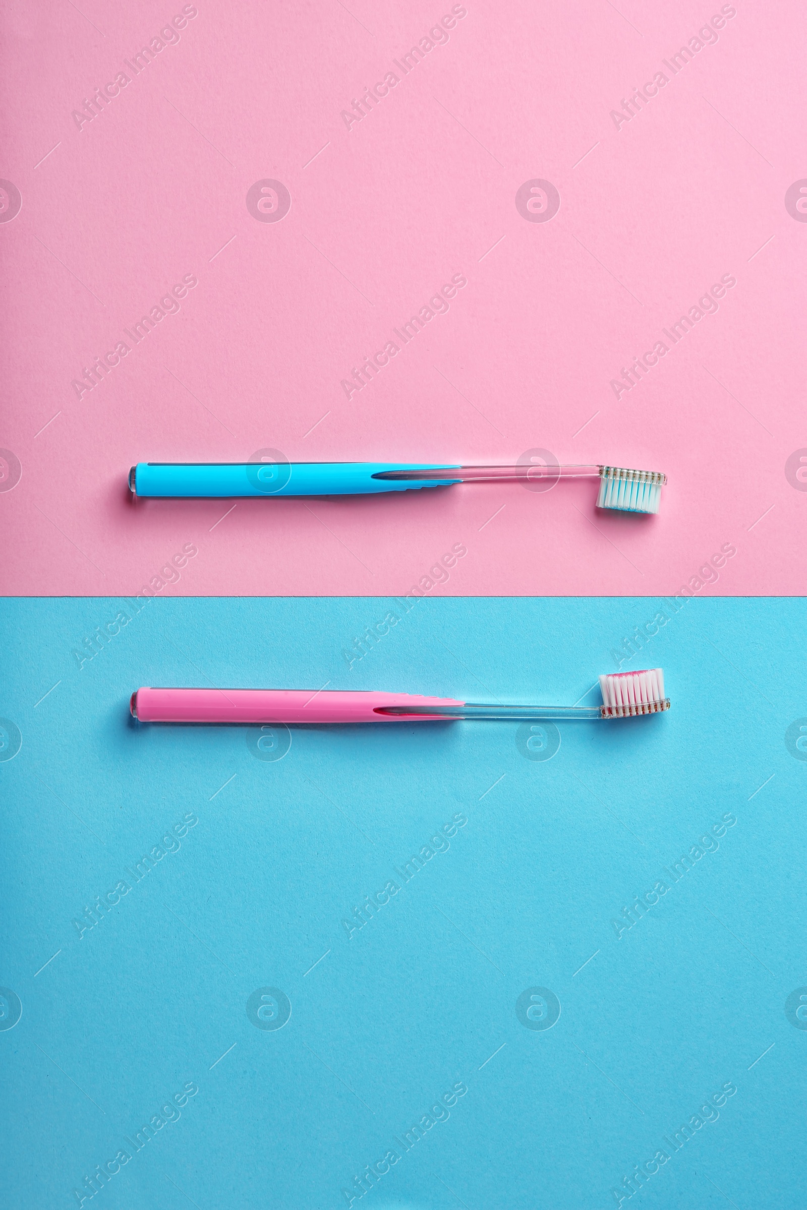 Photo of Manual toothbrushes on color background. Dental care