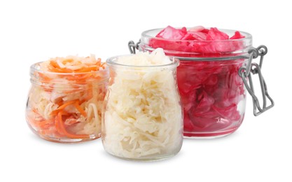 Photo of Delicious sauerkraut prepared according to different recipes on white background