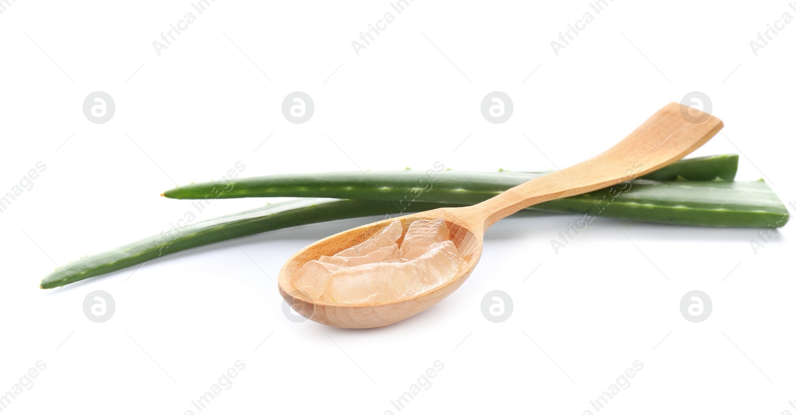 Photo of Wooden spoon with aloe vera gel and green leaves on white background