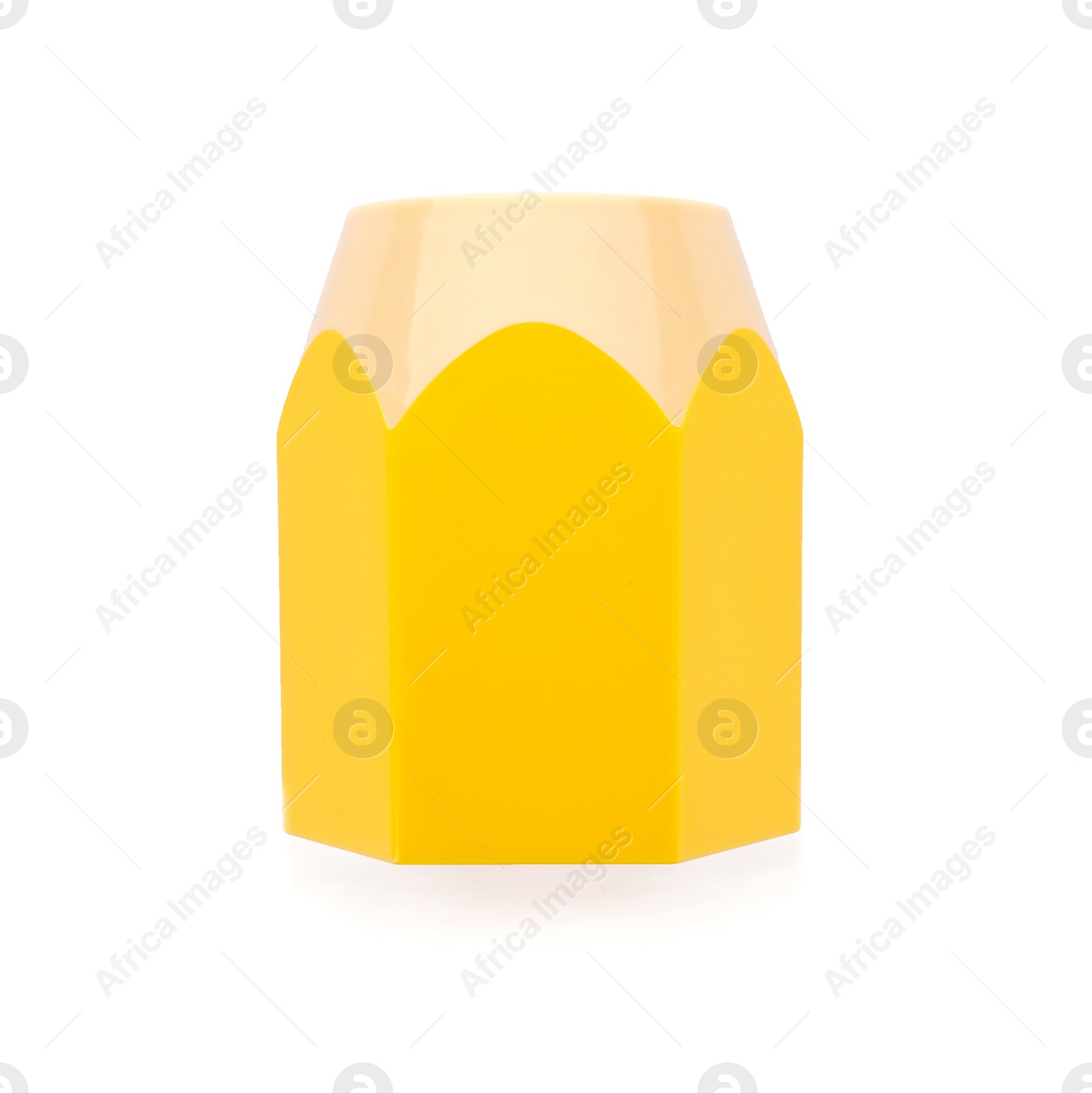 Photo of Yellow pencil sharpener on white background. Stationery for school