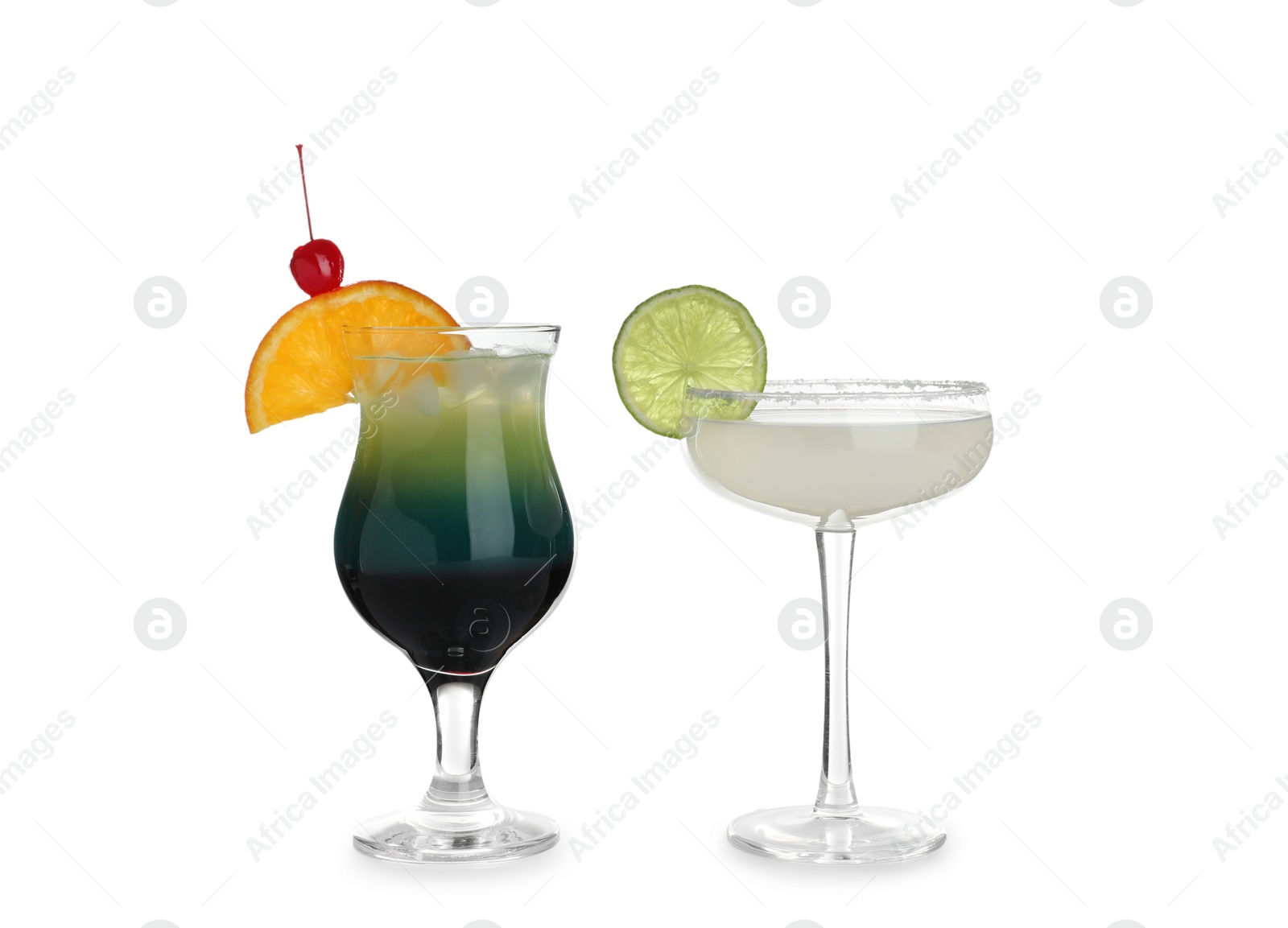 Photo of Glasses of traditional alcoholic cocktails on white background