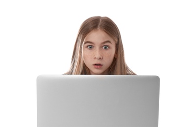 Photo of Shocked teenage girl with laptop on white background. Danger of internet