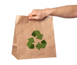 Image of Man holding paper bag with recycling symbol on white background, closeup