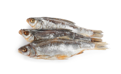 Photo of Tasty dried fish isolated on white. Seafood