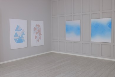 Photo of Empty hall of modern art gallery with exhibits