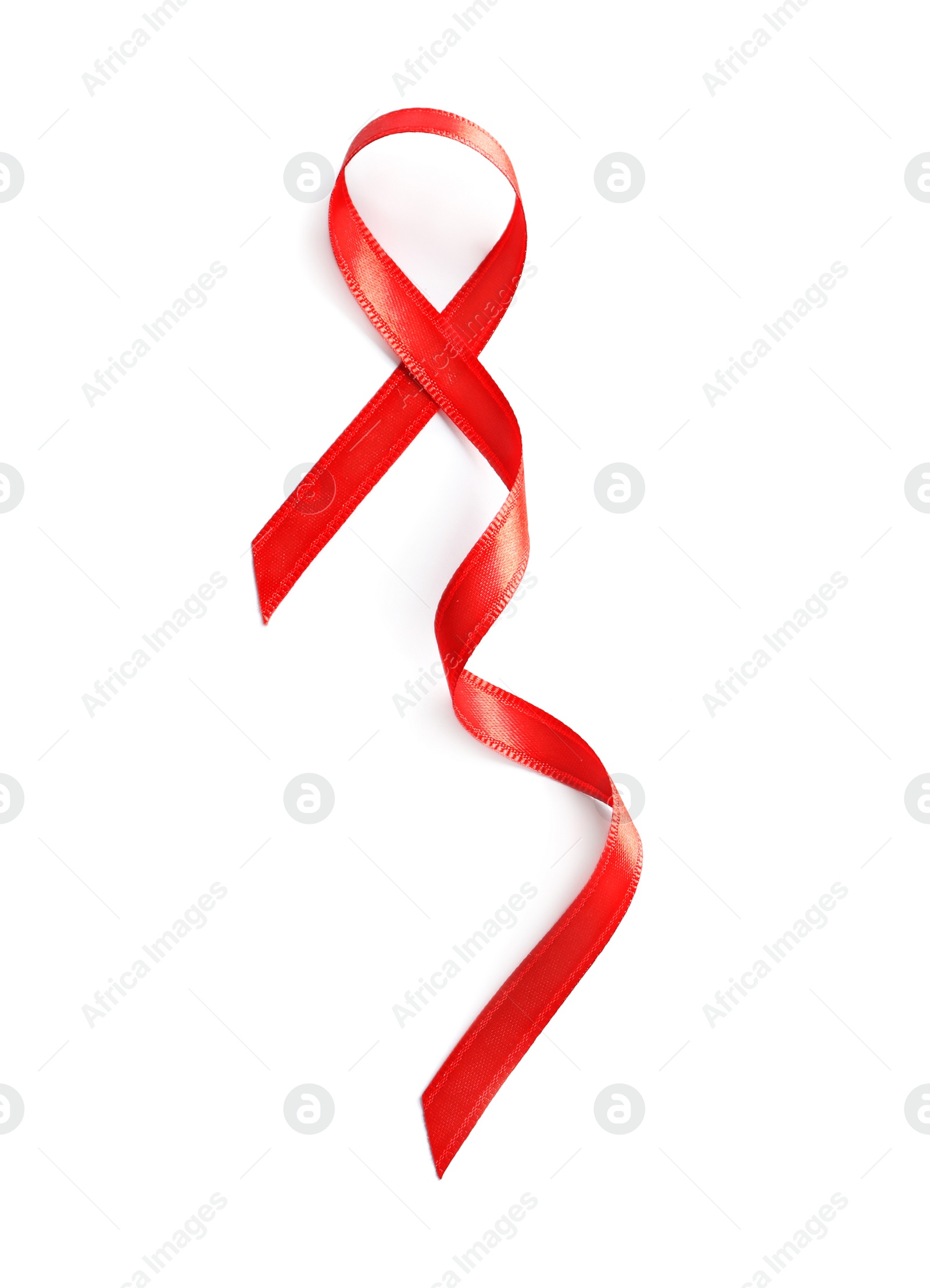 Photo of Red ribbon on white background, top view. Cancer awareness