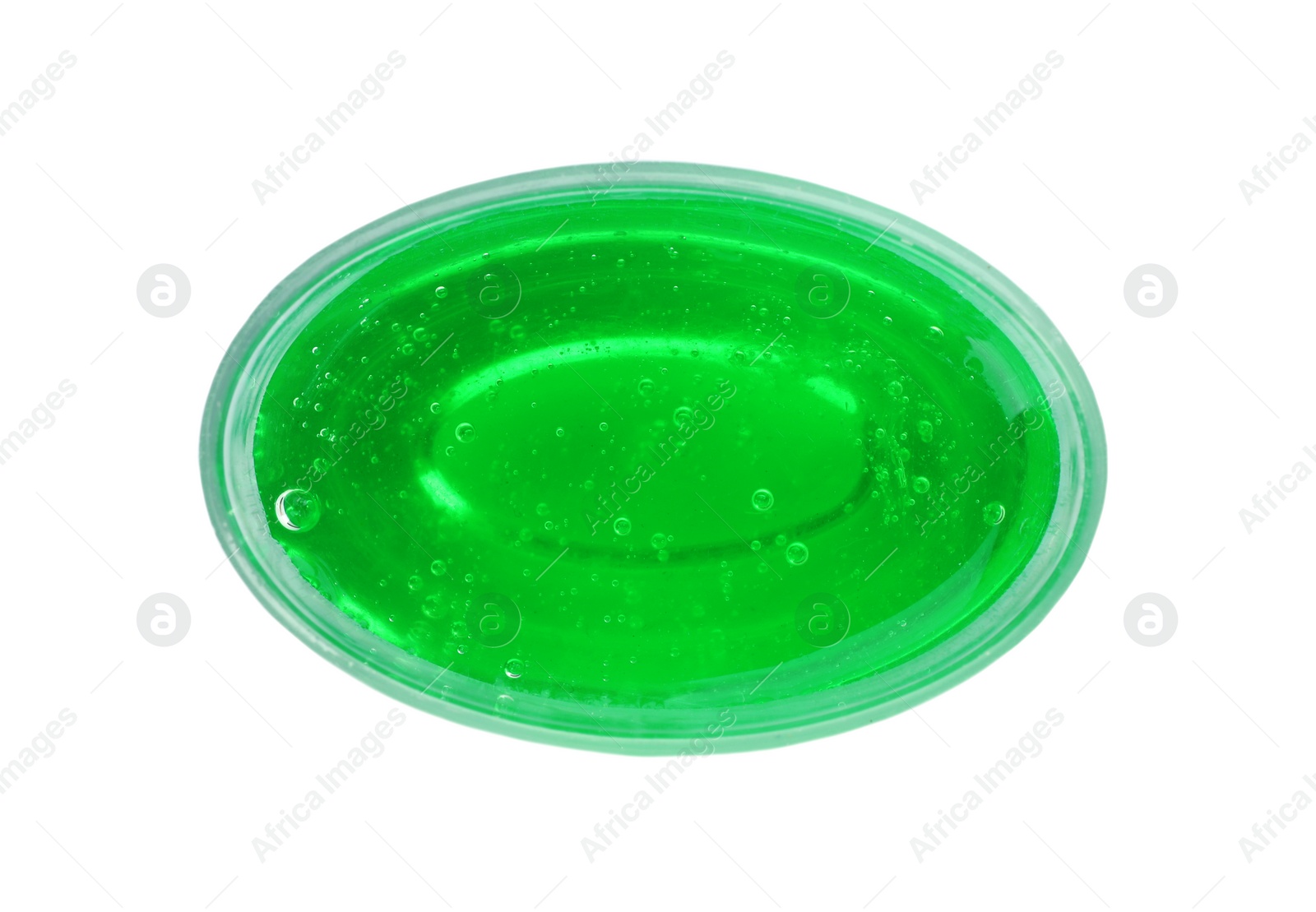 Photo of Green slime in plastic container isolated on white, top view. Antistress toy
