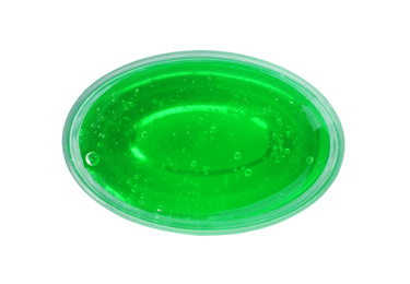 Photo of Green slime in plastic container isolated on white, top view. Antistress toy