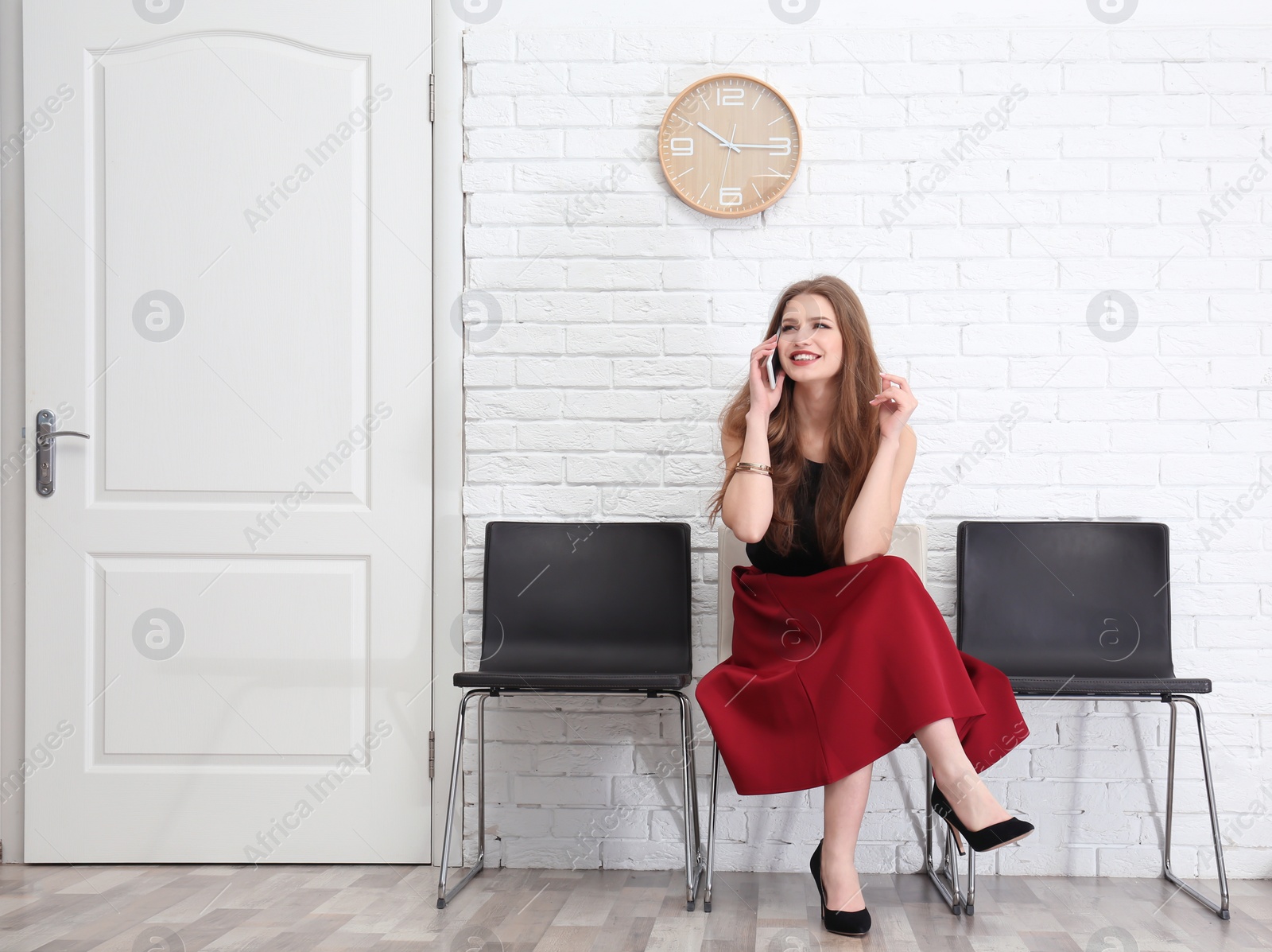 Photo of Young woman waiting for job interview, indoors