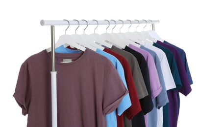 Photo of Men clothes hanging on wardrobe rack against white background