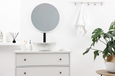 Photo of Different bath accessories and personal care products in bathroom