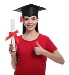 Photo of Happy student with graduation hat and diploma on white background