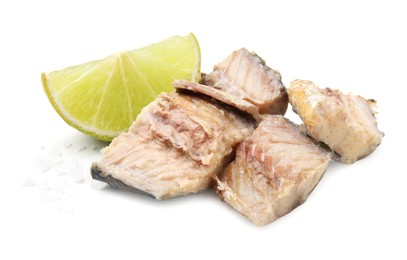 Photo of Delicious canned mackerel chunks with salt and lime on white background