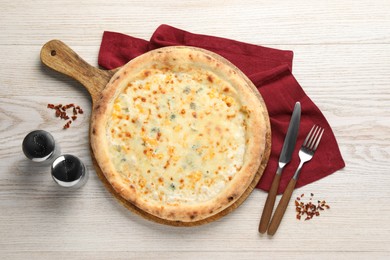 Photo of Delicious cheese pizza served on white wooden table, flat lay