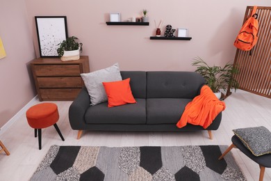 Photo of Modern living room interior with comfortable grey sofa
