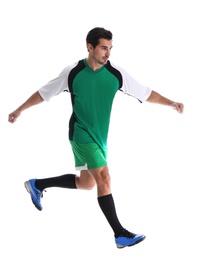 Photo of Young man playing football on white background
