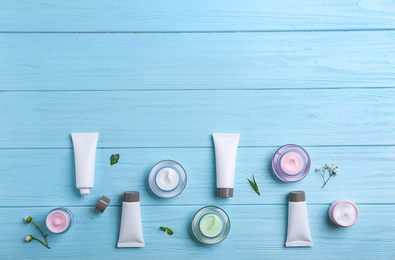 Photo of Set of natural cosmetics on wooden background