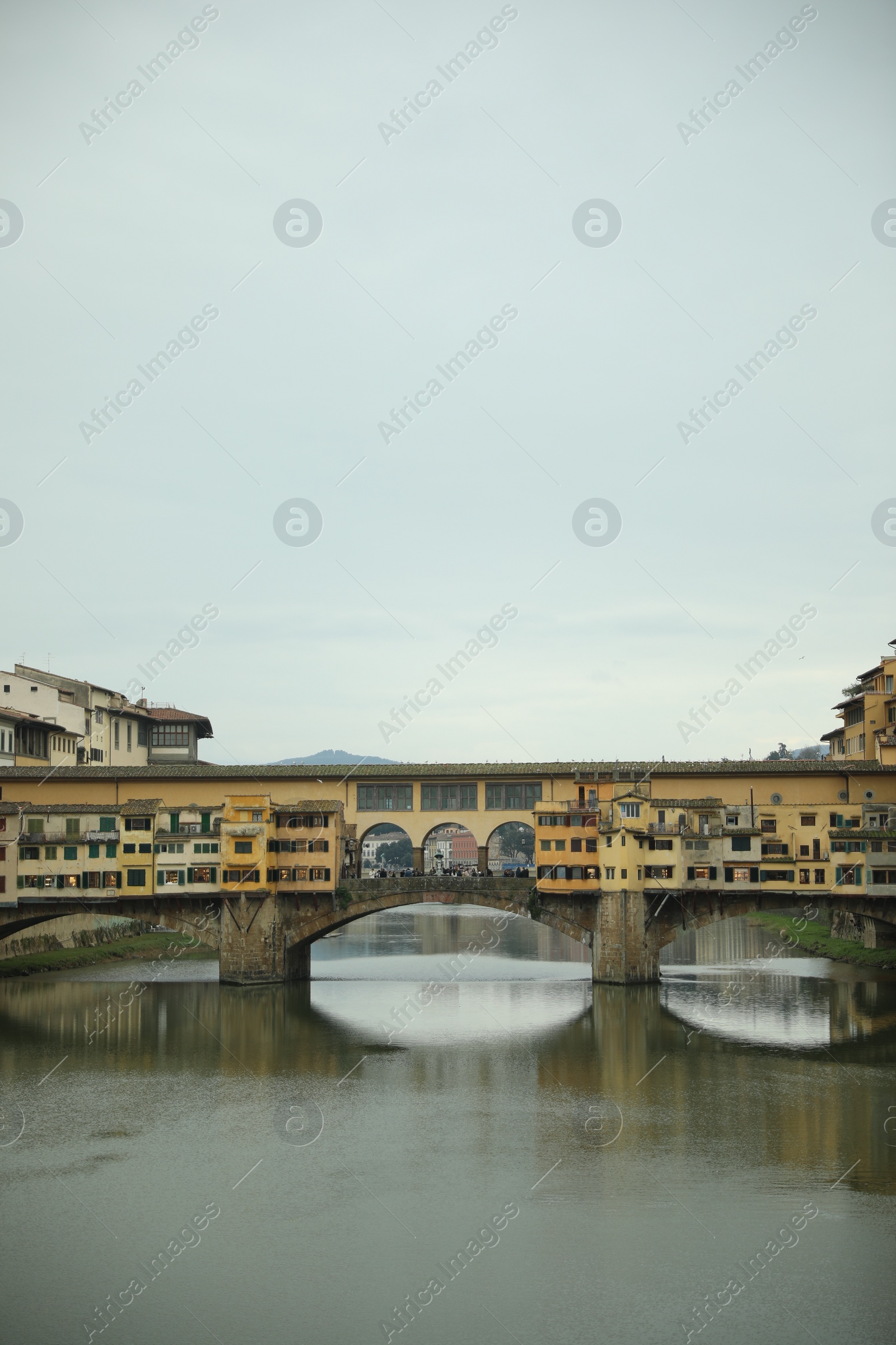 Photo of Florence, Italy - February 8, 2024: Picturesque view of city with beautiful buildings and river