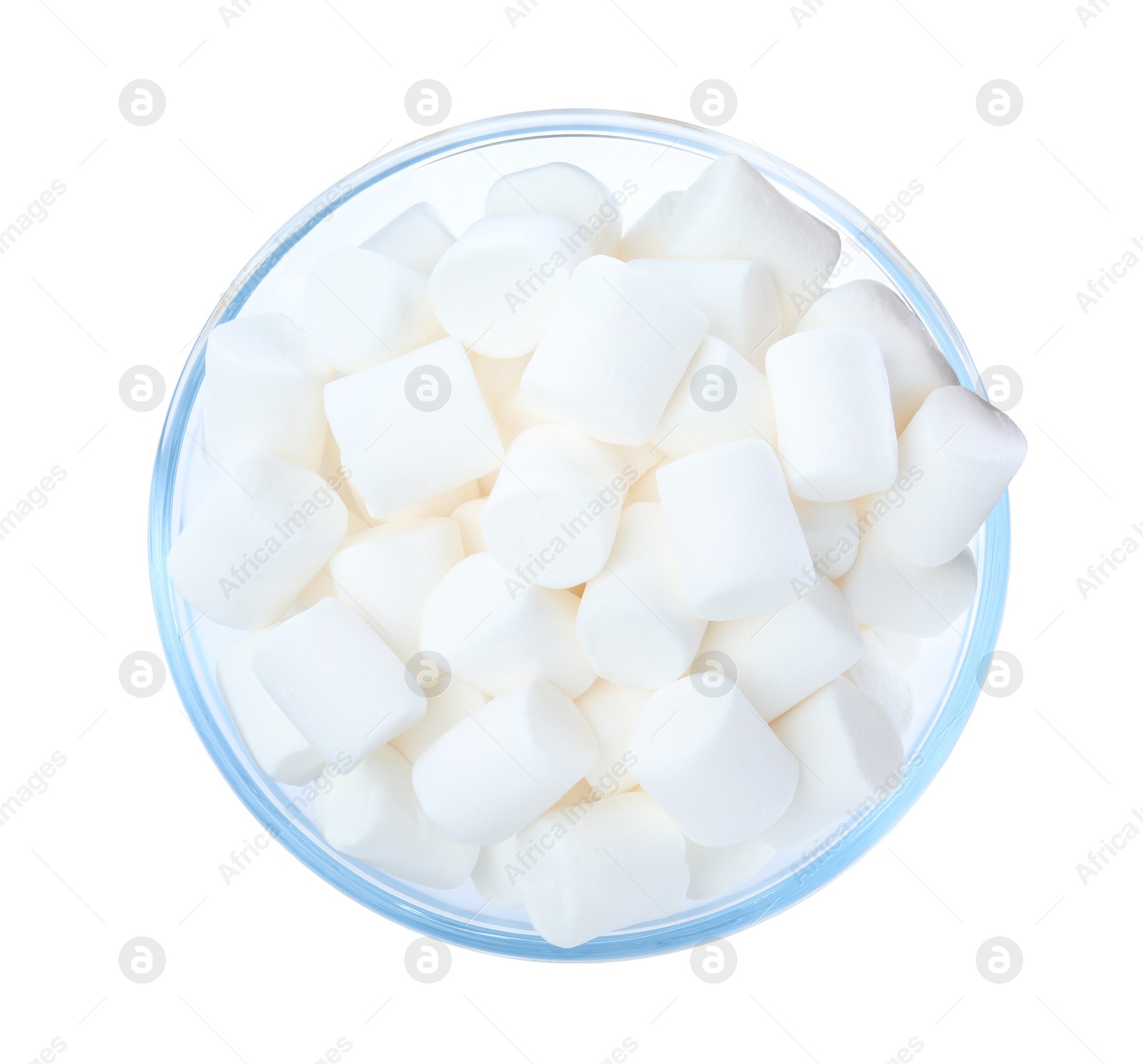 Photo of Delicious puffy marshmallows in glass bowl on white background, top view