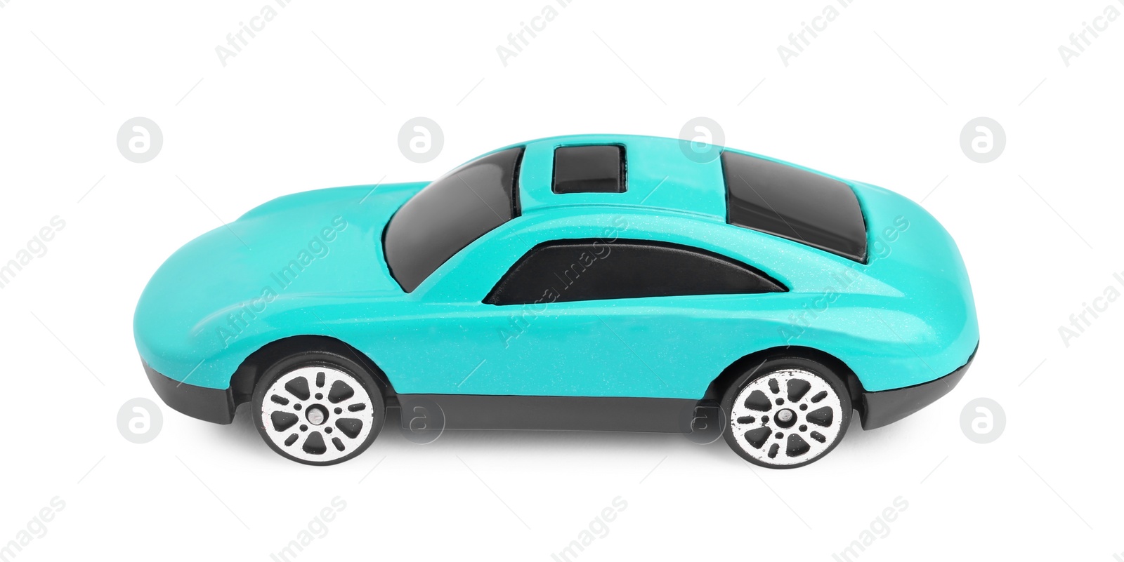 Photo of One turquoise car isolated on white. Children`s toy