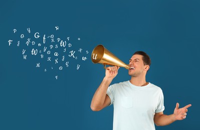 Image of Man using megaphone on blue background. Letters flying out of device