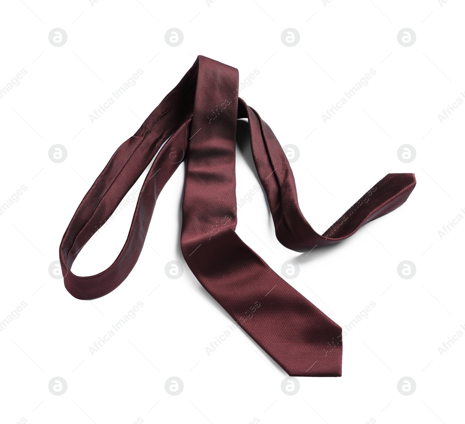 Photo of One brown necktie isolated on white, above view