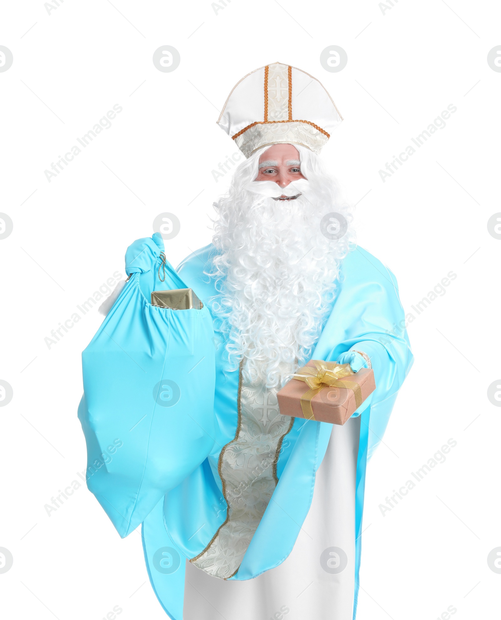 Photo of Portrait of Saint Nicholas holding sack with presents on white background