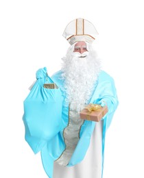 Photo of Portrait of Saint Nicholas holding sack with presents on white background