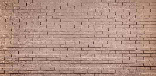 Wall paper design. Brown brick wall as background