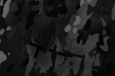 Image of Texture of camouflage fabric as background, top view. Black and white effect