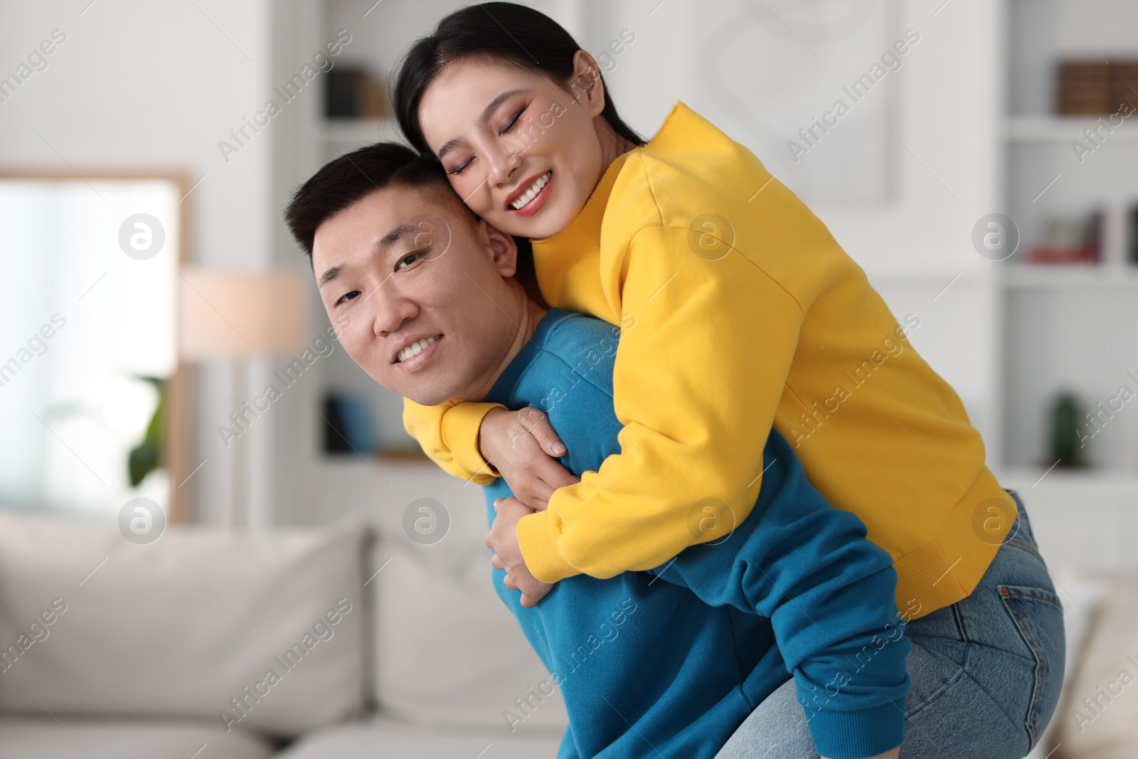 Photo of Happy couple spending time together at home