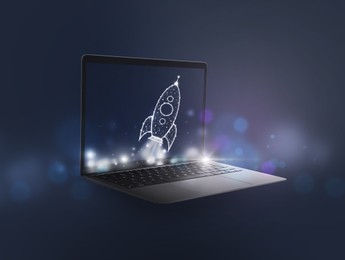 Image of Business startup concept. Illustration of launching rocket from laptop against dark background