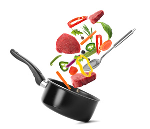 Image of Pot and fresh ingredients for soup on white background