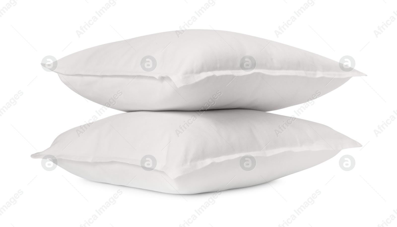 Photo of Two new soft pillows isolated on white