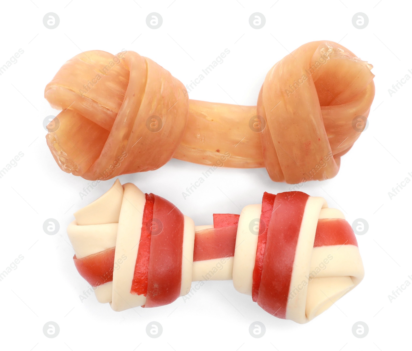 Photo of Bone dog treats isolated on white, top view