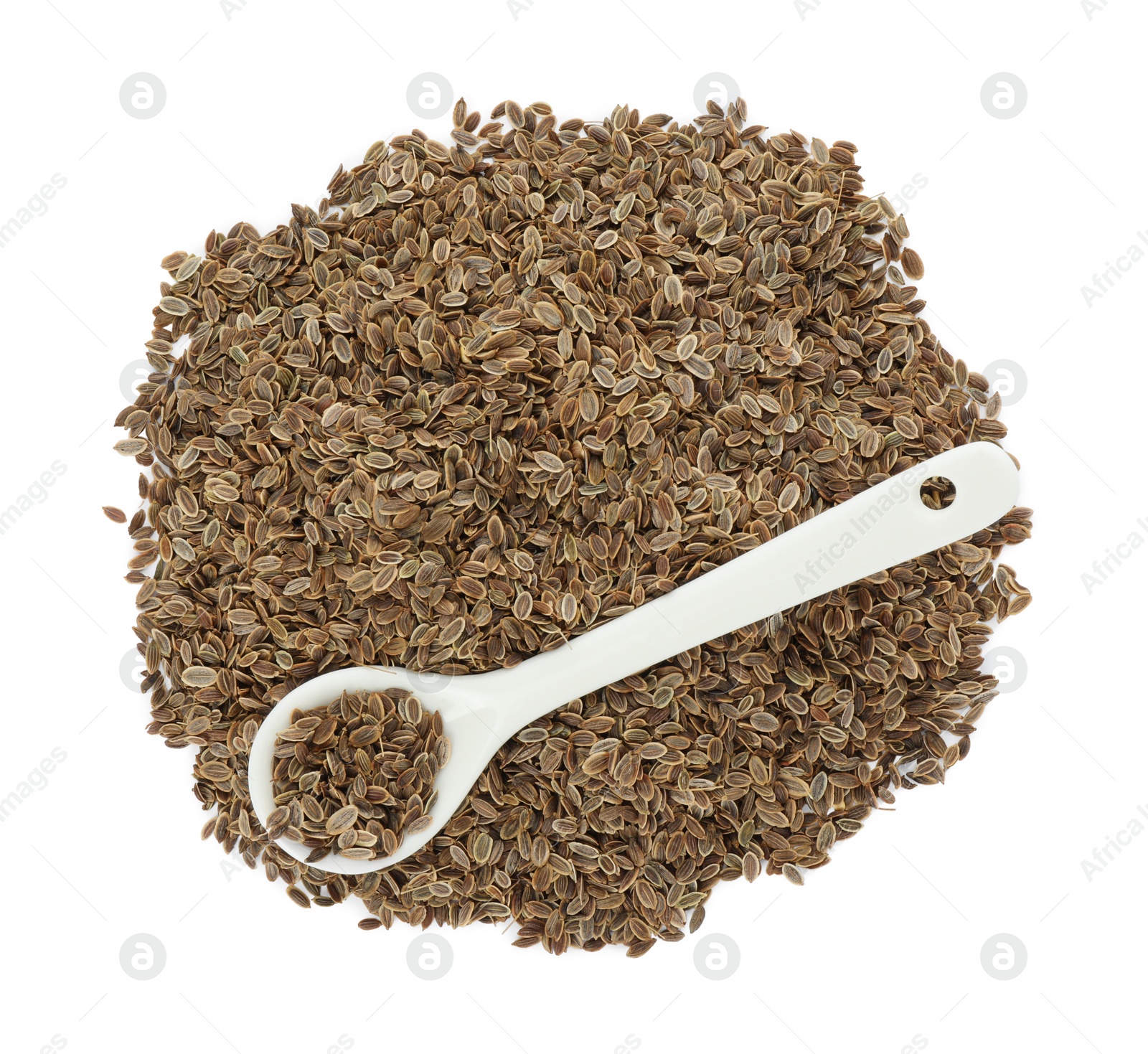 Photo of Pile of dry dill seeds and spoon isolated on white, top view