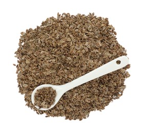Pile of dry dill seeds and spoon isolated on white, top view